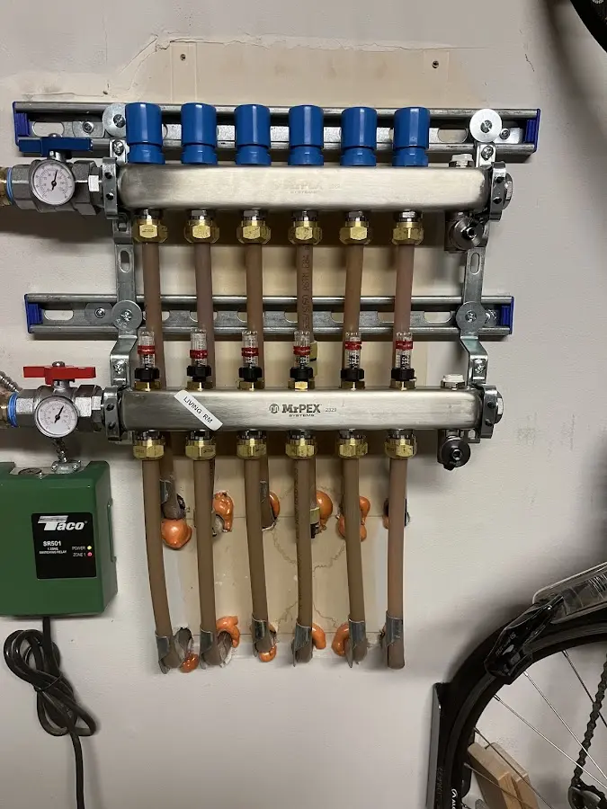 Plumber performing Water Heater Repair at a residential property in Neversink